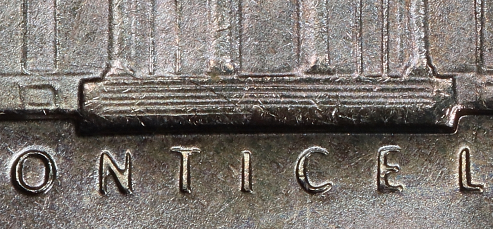 Close-up of a 1983 Jefferson nickel Full Steps reverse showing all six sharp horizontal step lines on Monticello
